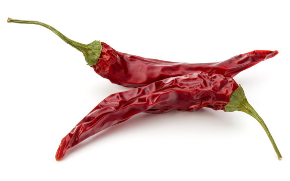 Dried red chili or chilli cayenne pepper isolated on white  back
