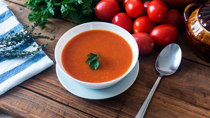 hot fresh homemade tomato soup with thyme, top view