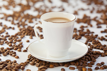 coffee in coffee cup with natural grains