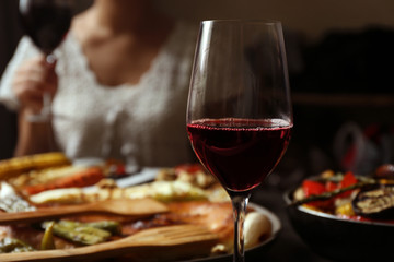 Delicious dinner with grilled vegetables and wine