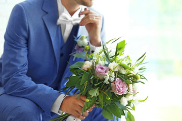 Obraz na płótnie Canvas Groom with beautiful bouquet, closeup