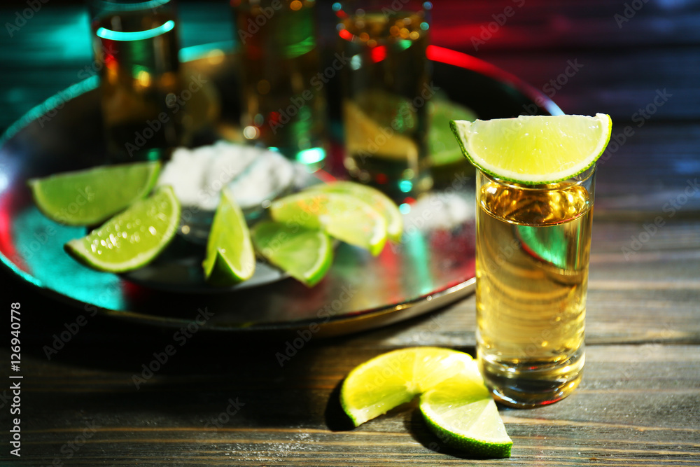 Canvas Prints Gold tequila shot with lime in bar