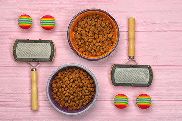 Pet accessories on wooden background