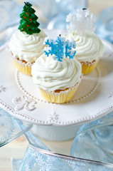 Obraz na płótnie Canvas Christmas cupcakes with cream cheese