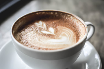 hot coffee latte art in coffee shop.selective