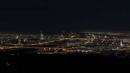 Fototapeta premium Vienna, aerial view at night with the river danube