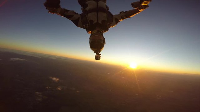 Skydiving sunset man