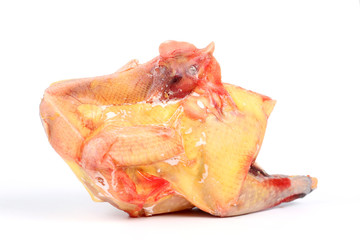 A frozen chicken isolated on a white background.