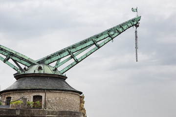 Quay of the old crane in Wurzburg on the bank of the Main river