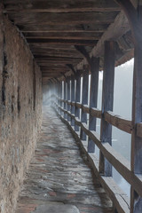 Fog on the city walls of Rothenburg, early in the morning