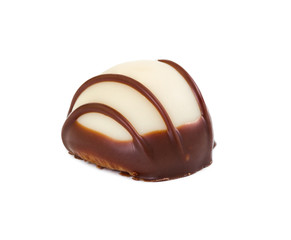 Candy of white chocolate with dark chocolate icing