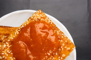 cheesecake with sesame seeds and jam