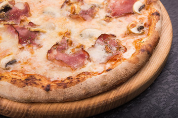 tasty italian pizza with bacon and mushrooms
