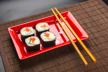 still life - set the rolls on a red plate