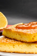 Fototapeta na wymiar cheesecake with sesame seeds and jam