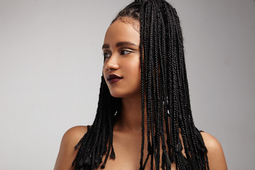 black woman's profile. African braids. false hair concept - obrazy, fototapety, plakaty