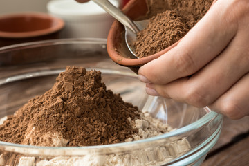 Woman making a dough at home