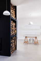 High rack to store firewood indoor and minimalist desk