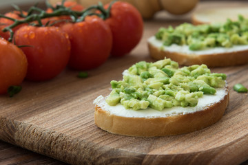 Cooking bruschetta with cream cheese and veggies