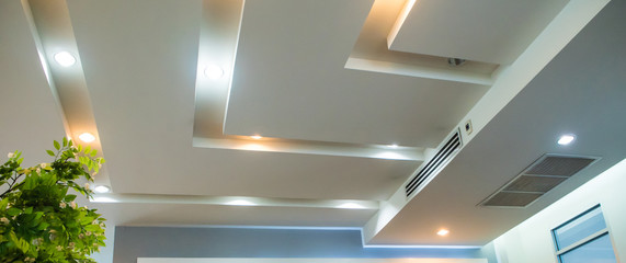 Lighting on the modern office ceiling - obrazy, fototapety, plakaty