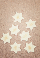 Star shaped cookies on  baking paper