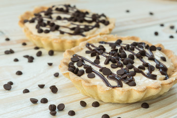 Tartlet with custard and chocolate