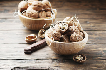 Healthy walnuts on the wooden table
