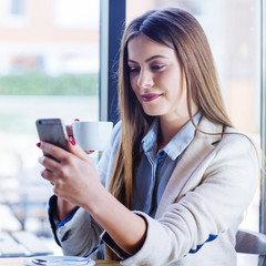 Beautiful Young Woman Having Coffee