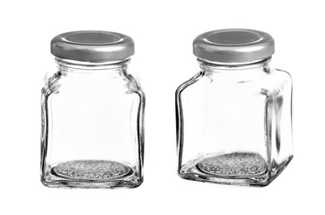 Empty glass jar isolated on white background
