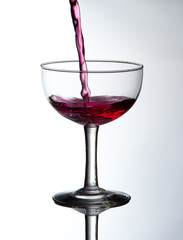 Red wine pouring