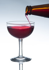 Red wine pouring