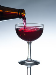 Red wine pouring
