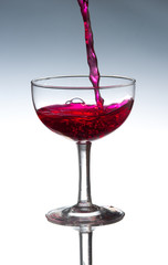 Red wine pouring