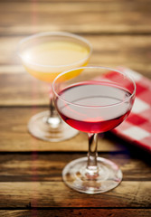 Various alcoholic cocktails on wood