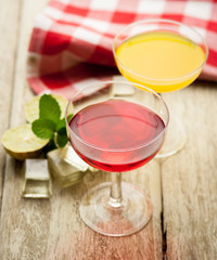 Various alcoholic cocktails on wood