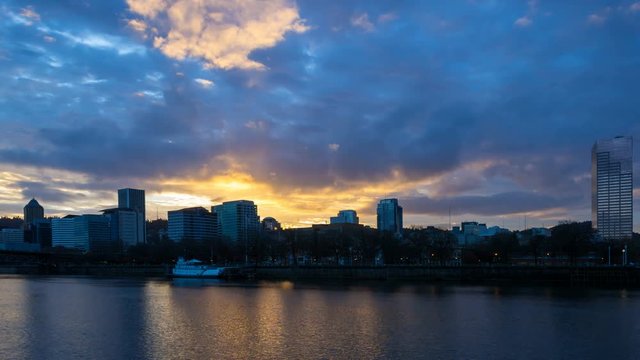 Ultra high  definition 4k time lapse movie of clouds and auto traffic along Willamette River waterfront in downtown Portland Oregon at colorful sunset 4k uhd 4096x2304