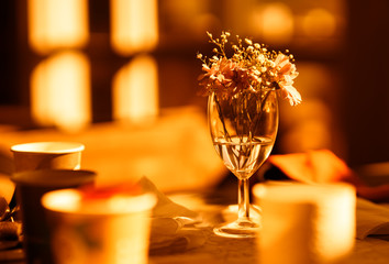 Sunset cafe flowers on the table