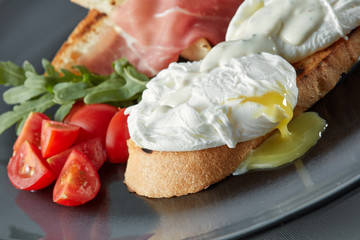 Eggs Benedict on toasted muffins