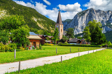Stunning green field and alpine village with mountains,Altaussee,Austria