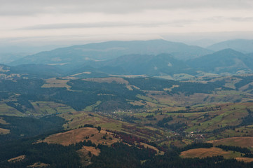 Fototapeta na wymiar Landscape of small village on forest at Carpathian mountains.