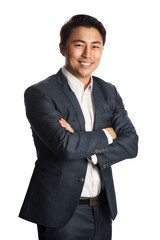 A well dressed businessman in a blue suit and white shirt, standing against a white background smiling towards camera.