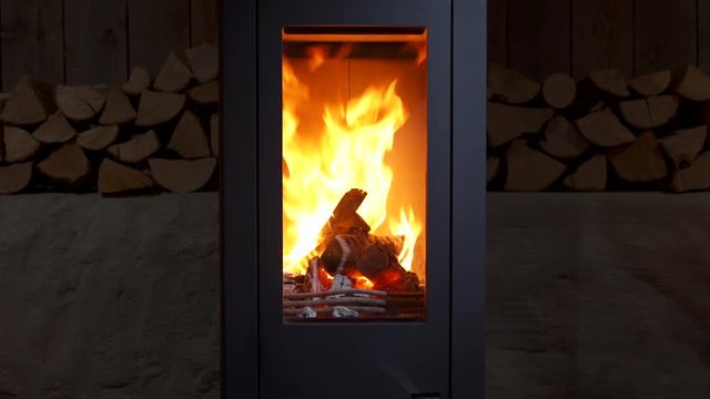 Burning Wood In The Fireplace.
