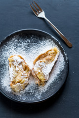 Apple strudel on the plate
