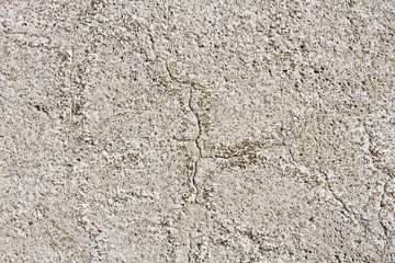 Closeup of cracked concrete floor texture