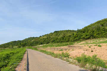 View of road and hill at countryside , Thailand
