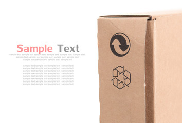 Cardboard box with recycle logo on white background