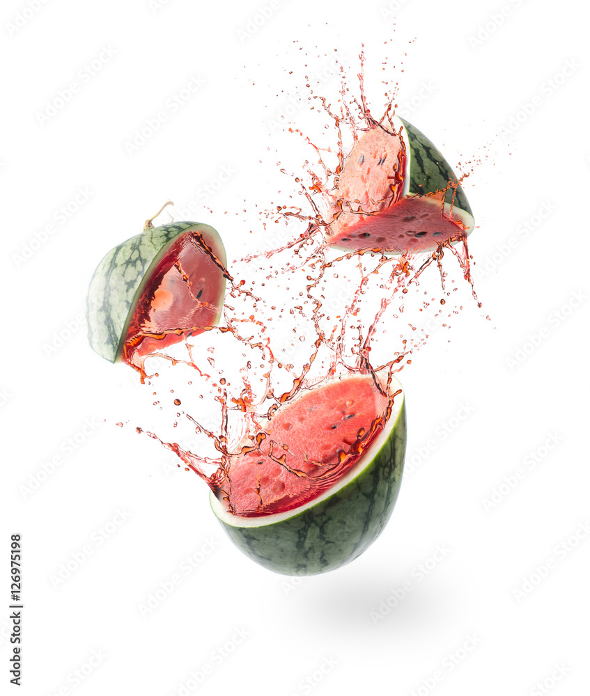 Wall mural Sliced Watermelon and splash isolated on white