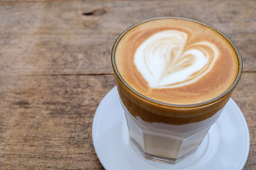 Hot coffee on the wood.