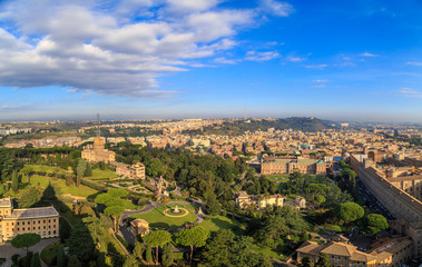 Fototapeta na wymiar View at the Vatican Gardens in Rome from the dome of St. Peter, sunny morning