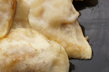 Chinese food. Fried dumplings with pork and vegetables